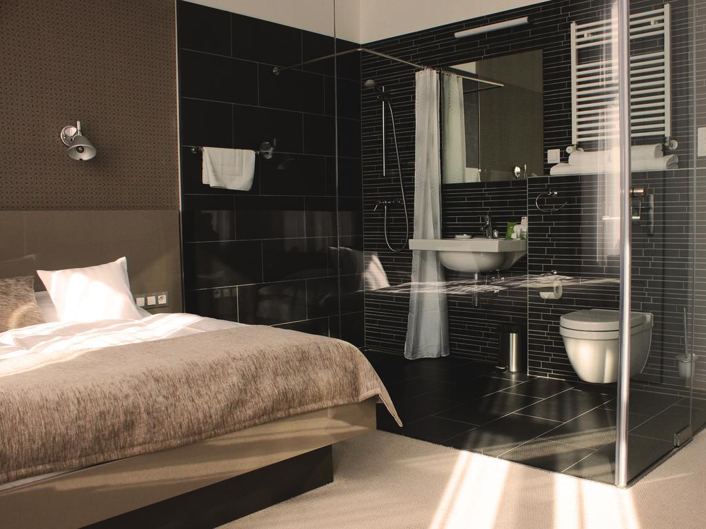 Hotel Lev Levice Rom bilde
